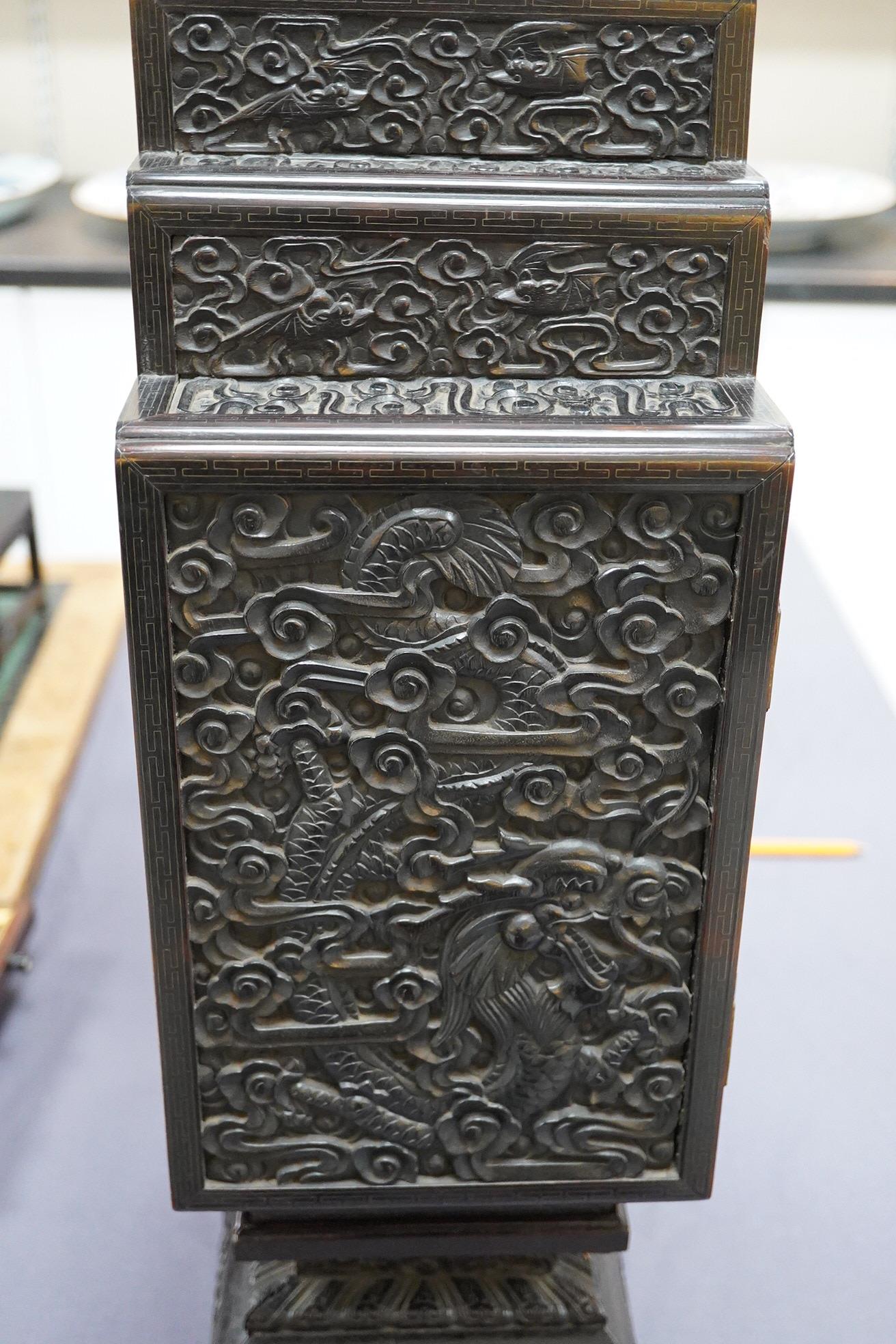 An important pair of Chinese carved zitan and silver wire inlaid ‘cloud and dragon’ curio cabinets and stands, duobaoge, probably Imperial, late Qing dynasty